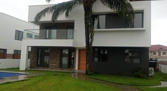 4 bedroom executive town house with 1 room out house and a swimming pool for rent at Tse Addo