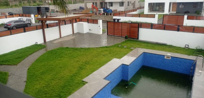 4 bedroom executive town house with 1 room out house and swimming pool for sale at Tse Addo